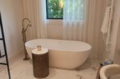 Bathroom renovating with bath tub kept on side
