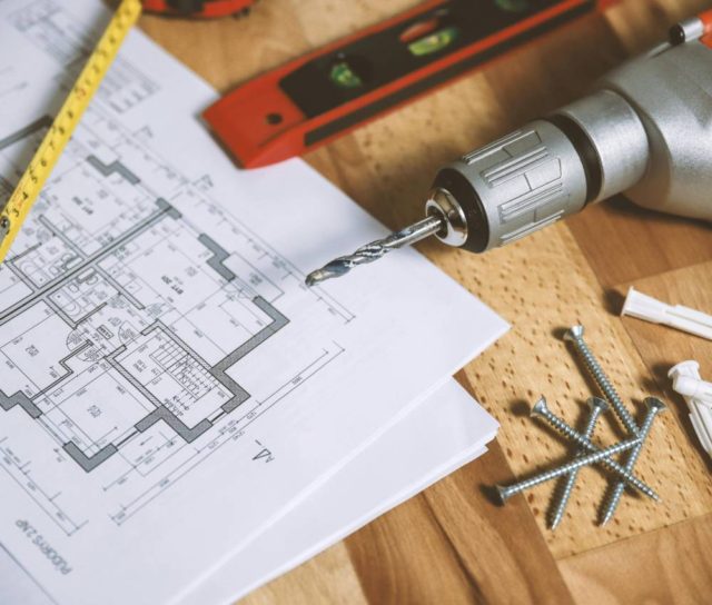 House Drawing, Drilling machine and screws kept on table